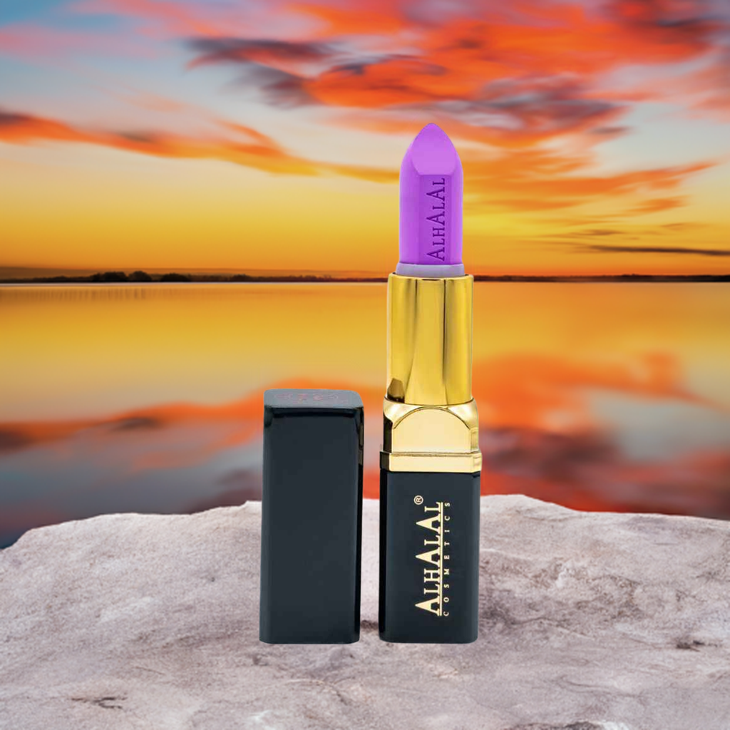 Alhalal cosmetics PARSE LIPPENSTIFT paarse velvet lipstick met gouden huls bij zonsondergang