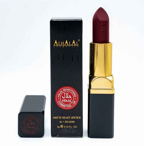 Batom de veludo mate da Alhalal Cosmetics numa cor de batom rosa vermelho intenso com embalagem preta e dourada